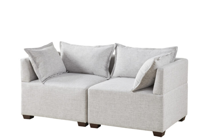 Create a comfortable seating arrangement in your living room with the modern sectional sofa chairs and ottoman. Upholstered in durable and resilient fabric