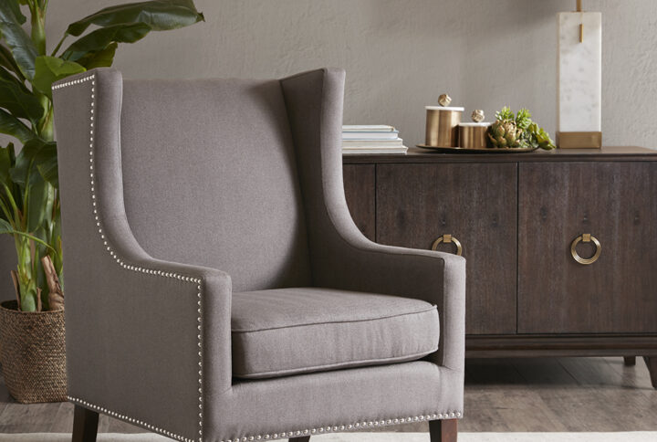 A wing back chair like this is a classic chair.  Combines our beaver brown herringbone fabric with contrasting silver nail head