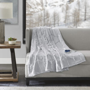 True North by Sleep Philosophy offers incredible comfort and style with the Raina Heated Metallic Print Throw. A silver metallic geometric design is beautifully printed on an ultra-soft plush grey base fabric. Emitting virtually no electromagnetic field emissions