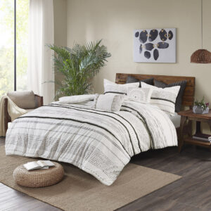 Give your bedroom a shabby chic update with the INK+IVY Cotton Printed Comforter Set with Trims. The 100% cotton comforter features a black stripe print with 6 rows of cotton tufted trims that add dimension to the charming boho look. Hidden bar tacks on the top of the comforter create a clean