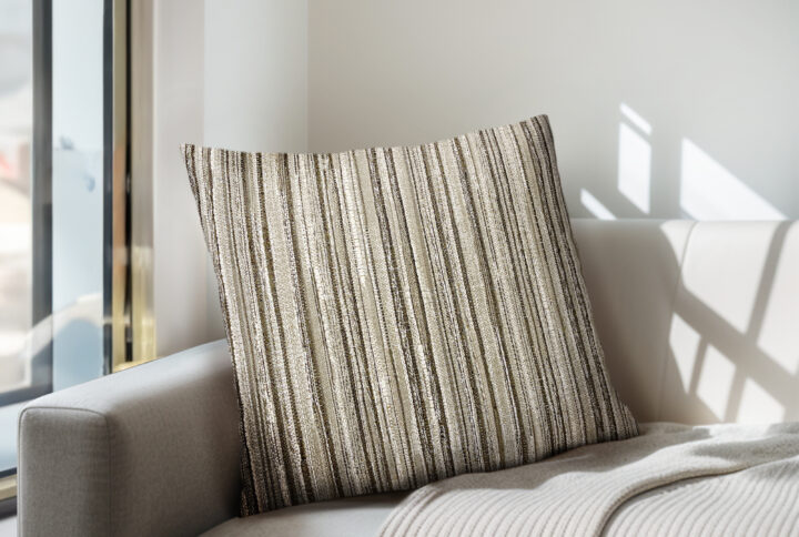 Enhance the timeless style of your living space with the Chapel Hill Multi Stripe Square Throw Pillow. Its neutral color and square shape make it a versatile choice for any room. The construction of the pillow sham includes a hidden zipper with a removeable shell. Unzip the sham to remove the insert for laundering purposes or for changing out your shams for seasonal decor. The included pillow insert is stuffed with 50% polyester fiberfill and 50% feathers. Its stripe design is a lovely addition to any room and pairs perfectly with the Chapel Hill chairs