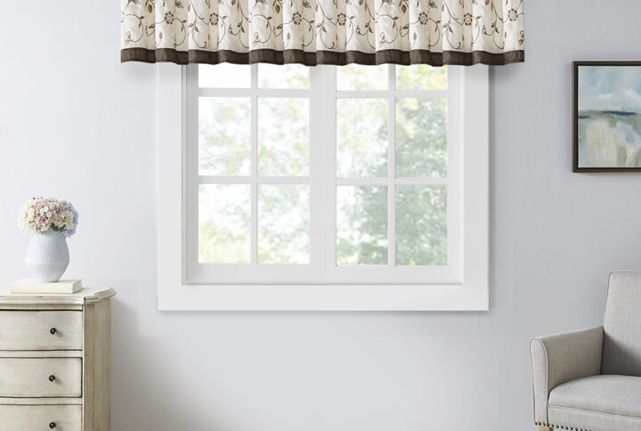 Add simple elegance to any room with the Madison Park Serene Embroidered Valance. This valance features delicate floral embroidery in soft green and natural hues