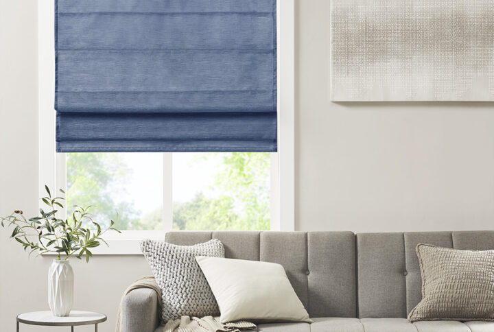 Our Madison Park Como Printed Faux Silk Room Darkening Cordless Roman Shade offers a modern and convenient update to your home decor. This roman shade flaunts a tonal blue faux silk textured fabric to create a stylish and beautiful