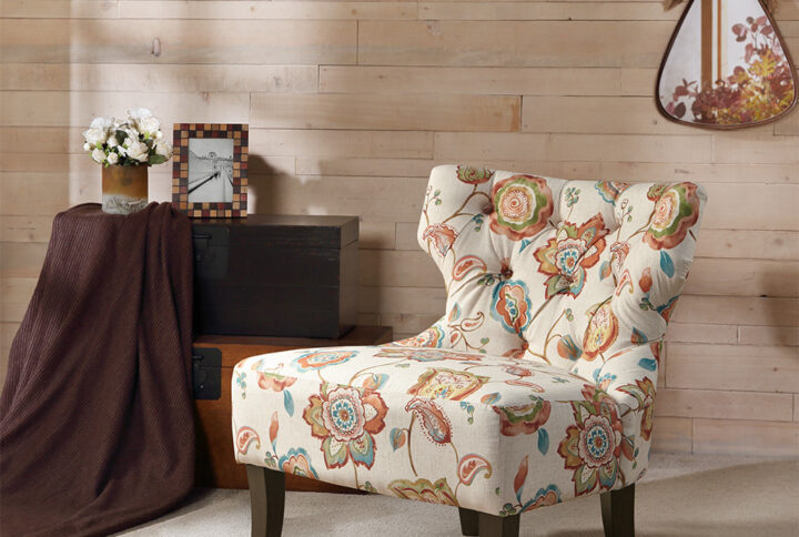 Complete your home decor with the modern charm of the Madison Park Erika Accent Chair. This armless accent chair features a low back and an attached cushion upholstered in a floral fabric