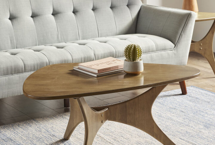 Update your living space with the Ink+Ivy Blaze Triangle Wood Coffee Table. Inspired from the mid-century modern design