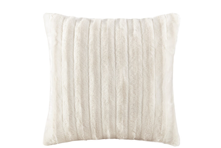 Indulge in luxury and comfort with this solid faux fur square pillow. Made from an ultra soft plush fabric