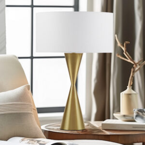 Introducing the Elixir Table Lamp by INK+IVY: a masterpiece of sophistication with its antique gold base and a captivating hourglass silhouette