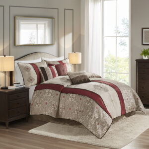 Donovan is an elegant update to your bedroom. This red comforter features a modern color blocked look with embroidered taupe details. The bold red stripes draw your eye into this beautiful comforter. Three decorative pillows further accentuate the colors and embroidered details in this collection. Also includes two king shams which pull the whole look together. The comforter is made from 100% polyester and is machine washable for easy care. Items in the set may come in a rolled or compressed packaging