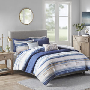 Create a relaxing and tranquil atmosphere in your bedroom with Madison Park’s Marina 8 Piece Printed Seersucker Comforter and Quilt Set Collection. The textured seersucker comforter features a watercolor stripe print in blue