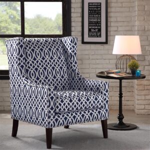 A wing back chair like this is a classic chair. Combining an updated print fabric with contrasting silver nail head