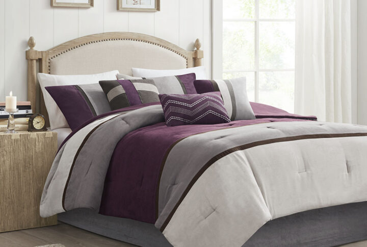 The Madison Park 7 Piece Palisades Comforter Set offers you a casual alternative in fashion bedding. The reverse of the comforter is solid purple. The soft microsuede in heather grey