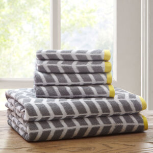 Add the Intelligent Design Nadia 6 Piece Towel Set to your bathroom for a fun and bright update! These 2-ply ring spun towels are cotton jacquard woven making them reversible in contrasting colors as well as incredibly absorbent. Each towel features a rich grey color geometric print with a small dobby border. These cotton towels are also Made in Green by OEKO-TEX certified