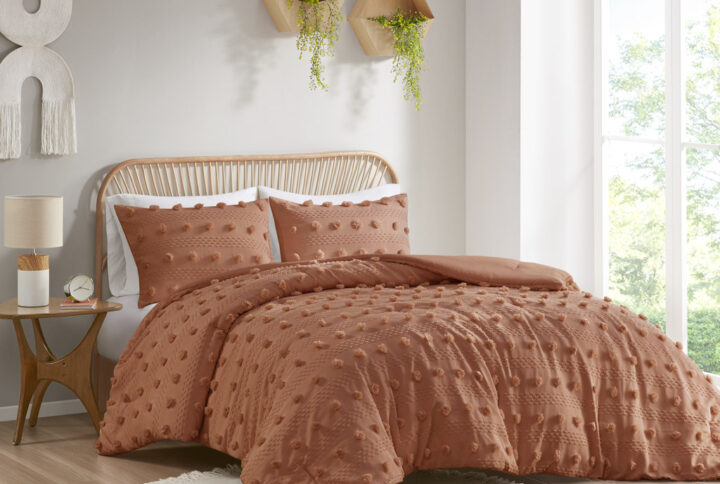 Refresh your bedroom with the elegant style of Intelligent Design's Lucy Clip Jacquard Comforter Set. This beautiful comforter features fun and playful clip jacquard pompoms all over the face that add dimension to the top of the bed for a lovely look. The matching shams (1 in Twin/TwinXL) also flaunt the delicate design of the comforter to complete the jacquard bedding set. Hypoallergenic polyester filling in the fashionable comforter contains no allergens and is treated to be dustproof. Machine washable for easy care