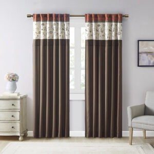 Add simple elegance to any room with the Madison Park Serene Embroidered Window Panel. This window curtain features delicate floral embroidery in rust spice and neutral hues