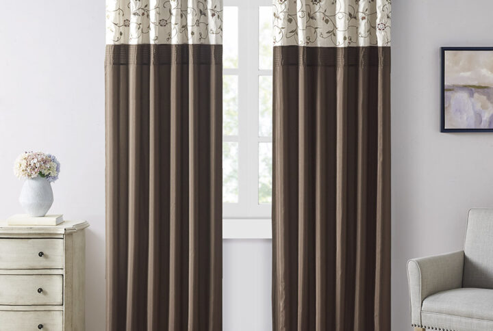 Add simple elegance to any room with the Madison Park Serene Embroidered Window Panel. This window curtain features delicate floral embroidery in rust spice and neutral hues