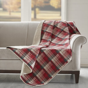 The Woolrich Tasha quilted throw features an all over red and tan plaid and reverses to a solid tan color. Made from 100% cotton this lightweight throw is soft to the touch and can be used year round.