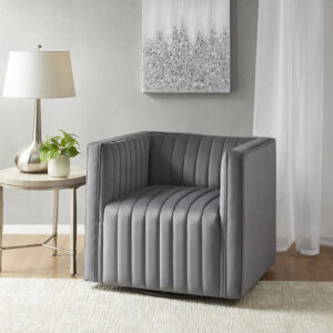 The Madison Park Sikora Channel Tufted Swivel Armchair offers a luxurious and modern update to your home décor. This swivel accent chair is upholstered in a gray polyester velvet fabric to provide a soft