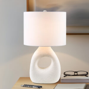 Brighten up your home with the INK+IVY Trilluxe Ceramic Table Lamp. This contemporary masterpiece features a uniquely shaped ceramic base in a textured matte-white finish