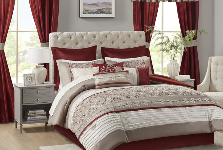 Update your entire space instantly with the Madison Park Essentials Jelena 24 Piece Room in a Bag. The bold red base on this comforter works beautifully with the soft white and red piecing. Decorative embroidery adorns the bottom portion of this comforter and the center of each sham creating a rich look in your space. Four solid red window panels