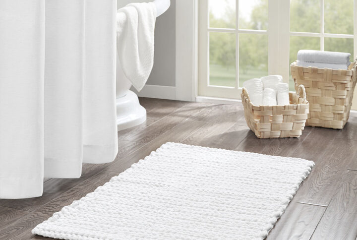 The Madison Park Lasso 100% Cotton Chenille Chain Stitch Rug provides a soft textural update to your bathroom decor. This cotton chenille bath rug features a woven chain stitch design that creates dimension and texture