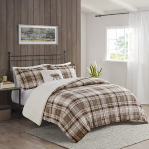 Bring the warmth and comfort of a cabin retreat to your bedroom with the Woolrich Alton Plush to Sherpa Down Alternative Comforter Set. Made from ultra-soft plush and reversing to a cozy berber