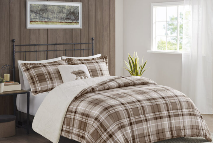 Bring the warmth and comfort of a cabin retreat to your bedroom with the Woolrich Alton Plush to Sherpa Down Alternative Comforter Set. Made from ultra-soft plush and reversing to a cozy berber