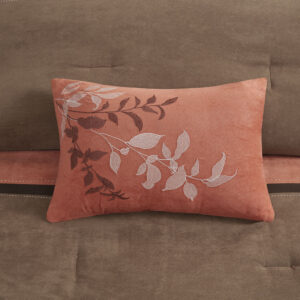 coral and brown is pieced together to create this beautiful bed. The decorative pillows are embroidered and pieced to add a decorative element to this simple