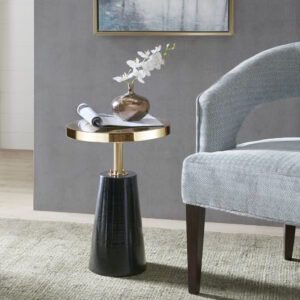 Bring a touch of elegance to your decor with the Madison Park Sophia Accent Table. This round table flaunts a high gloss black metal base with brushed gold electroplated top