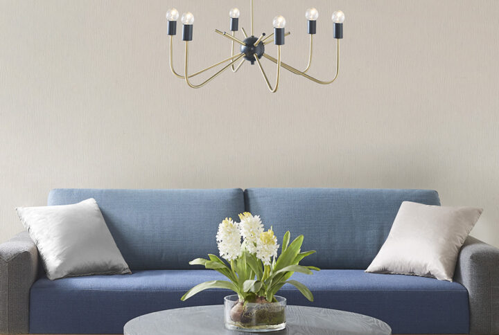 Elevate your kitchen or dining room with the bold and modern Hampton Hill Alexis 6-Light Metal Chandelier. Flaunting a two-tone antique brass and black finish