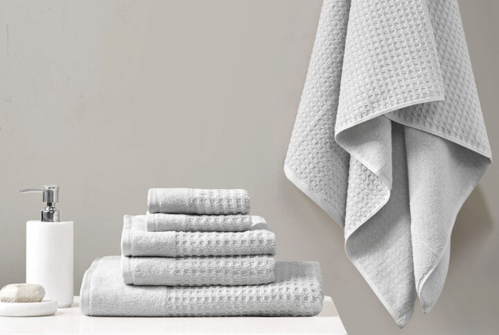 Our Madison Park Spa Waffle Cotton Towel 6 Piece Set provides the perfect textured update to your bathroom decor. This 100% cotton towel set features an all-over waffle combed jacquard design for a rich texture