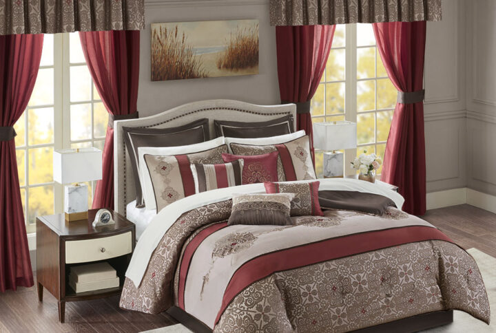 The Madison Park Essentials Delaney 24 Piece Room in a Bag offers a refined traditional update to your bedroom decor. The jacquard details flaunted on the pieced faux silk comforter