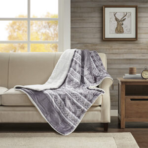 Cuddle up in the lush comfort of the Woolrich Anderson Down Alternative Throw. Made from ultra-soft faux mink fabric