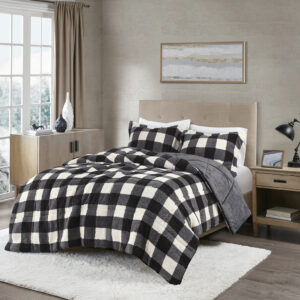 Bring a cozy look to your bedroom with the True North by Sleep Philosophy Brooks Print Sherpa Down Alternative Comforter Set. The comforter features an ivory and black buffalo check print with a plush reverse