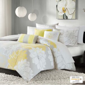 The Madison Park Lola 6 Piece Printed Duvet Cover Set transforms your bedroom into a beautiful and graceful space. A gorgeous floral print in a soft white and yellow hue pops against the solid taupe grey ground cotton duvet cover and shams for a stunning transitional look. Three decorative pillows with embroidered details and fabric manipulation add texture and dimension to the bed