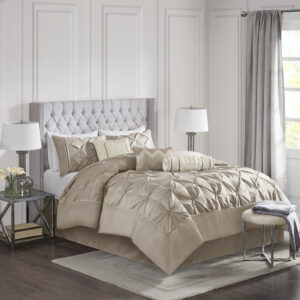 This beautifully tufted bed is from the Laurel bedding collection. Its neutral taupe coloring makes this set easy to accessorize in your bedroom. The collection is made from 100% polyester polyoni and has pieced fabric sewn together to give this set dimension. It is finished with a smooth edge of fabric that creates a beautiful border around this comforter. Items in the set may come in a rolled or compressed packaging