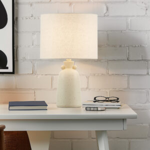 Brighten your space with the Ink+Ivy Alarid accent table lamp. Its ceramic base