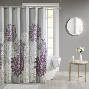 Transform your bathroom into a comfortably casual retreat with our Madison Park Essentials Maible Printed Floral Shower Curtain. This shower curtain features a beautiful printed floral design