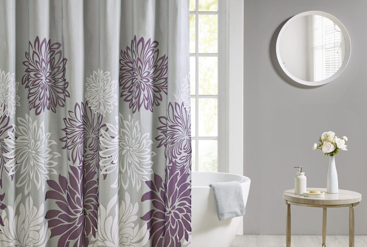 Transform your bathroom into a comfortably casual retreat with our Madison Park Essentials Maible Printed Floral Shower Curtain. This shower curtain features a beautiful printed floral design