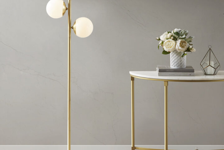 Update your space with the unique style of the INK+IVY Holloway 3-Globe Light Floor Lamp with Marble Base. This floor lamp features a white glass shade and a metal fixture with a gold finish for a striking contrast. The rounded shape creates a truly modern look for your living room or bedroom. Three Type B light bulbs are needed(not included).