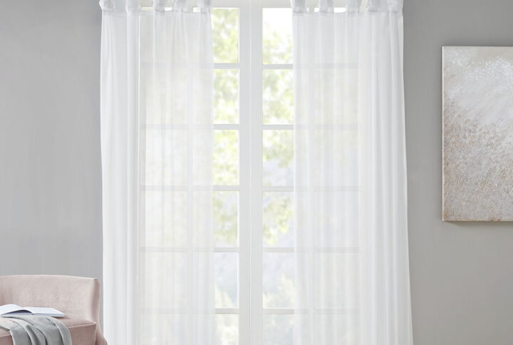 Soften your space with the Madison Park Ceres Twisted Tab Voile Sheer Window Pair. This soft panel pair provides a simple and airy update to your decor