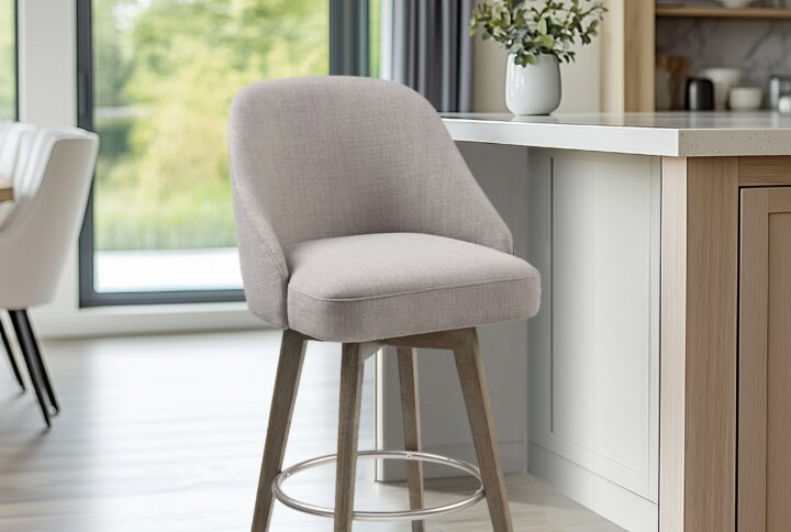 Elevate your kitchen or dining space with the Madison Park Pearce Swivel Counter Stool