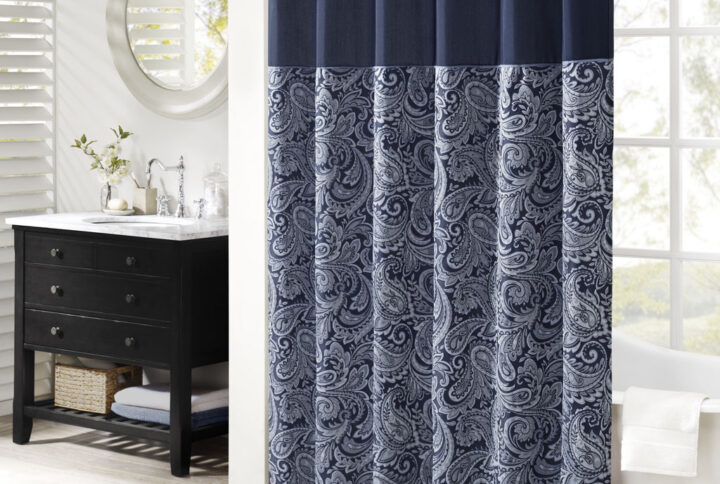 The Madison Park Aubrey Polyester Jacquard Shower Curtain creates a sophisticated modern look in your bathroom. The pieced design flaunts a beautiful woven jacquard in an updated paisley motif with a large solid stripe at the top of the shower curtain. This jacquard shower curtain is machine washable for easy care. Complete the collection and look with coordinate bath towels