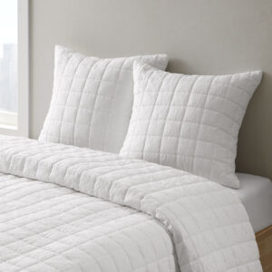 The Cocoon Quilt Top Euro Sham by N Natori adds a simple and elegant touch to your bedroom décor. This solid Euro sham flaunts super soft crushed microfiber with a lofty over-quilted bot pattern to create a rich and textural modern look. A hidden zipper closure provides a clean