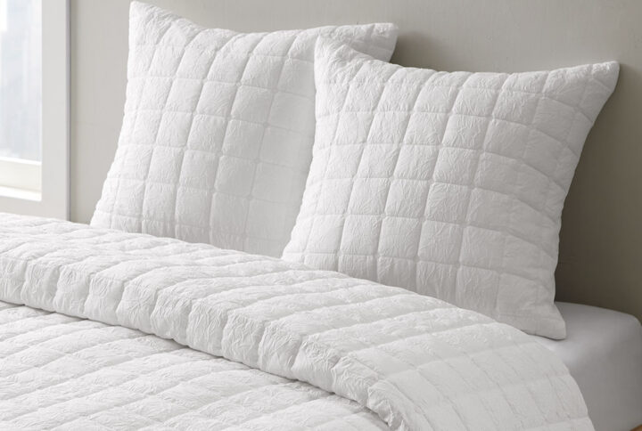 The Cocoon Quilt Top Euro Sham by N Natori adds a simple and elegant touch to your bedroom décor. This solid Euro sham flaunts super soft crushed microfiber with a lofty over-quilted bot pattern to create a rich and textural modern look. A hidden zipper closure provides a clean