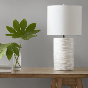 The 510 Design Crewe Textured Resin Table Lamp offers a clean and minimalistic update to your decor. Crafted from resin