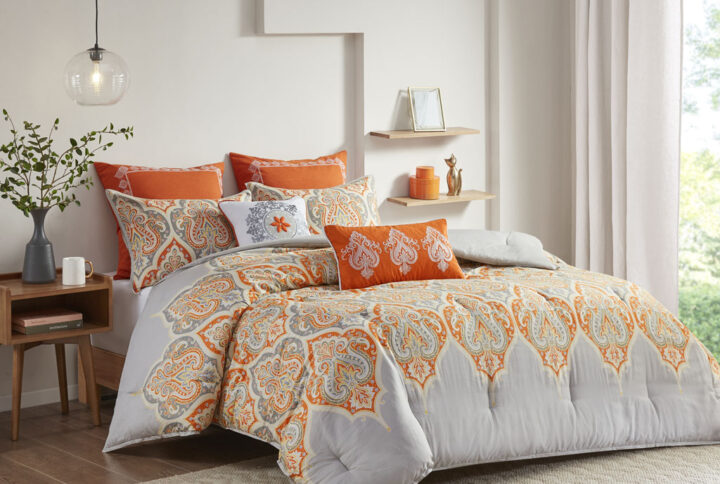 Update your bedroom with the globally inspired style of the Madison Park Nisha Comforter Set. This comforter features an updated paisley pattern inside an ogee design