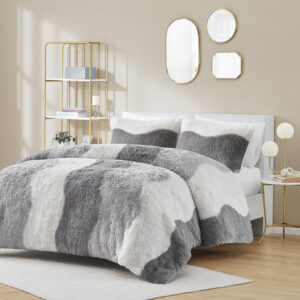 The Cassie shaggy faux fur comforter set showcases a unique