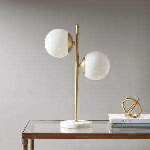 Update your space with the unique style of the INK+IVY Holloway Marble Base Table Lamp. This table lamp features a white glass shade and a metal fixture with a gold finish for a striking contrast. The rounded shape creates a truly modern look for your living room or bedroom. Two Type  A light bulbs are needed.