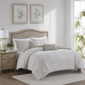 This casual farmhouse style comforter set features a pieced clip jacquard pattern in a white and natural two-tone stripe effect. Also included are two decorative pillows featuring either the matching clip jacquard design or embroidery details to add a touch of elegance to the overall design. Made with 100% hypoallergenic polyester filling