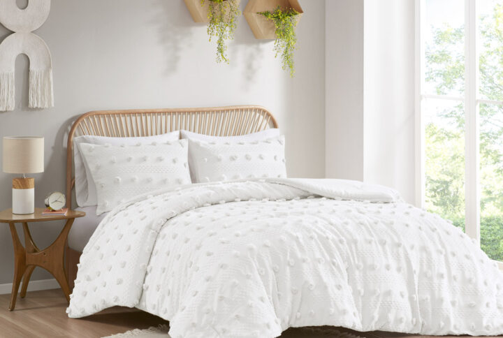 Refresh your bedroom with the elegant style of Intelligent Design's Lucy Clip Jacquard Comforter Set. This beautiful comforter features fun and playful clip jacquard pompoms all over the face that add dimension to the top of the bed for a lovely look. The matching shams (1 in Twin/TwinXL) also flaunt the delicate design of the comforter to complete the jacquard bedding set. Hypoallergenic polyester filling in the fashionable comforter contains no allergens and is treated to be dustproof. Machine washable for easy care